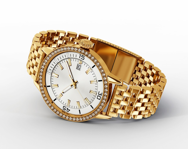 golden watch isolated on a white background