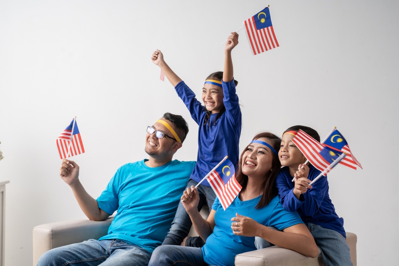 Creative Family Photoshoot Ideas - excited malaysian sport fans