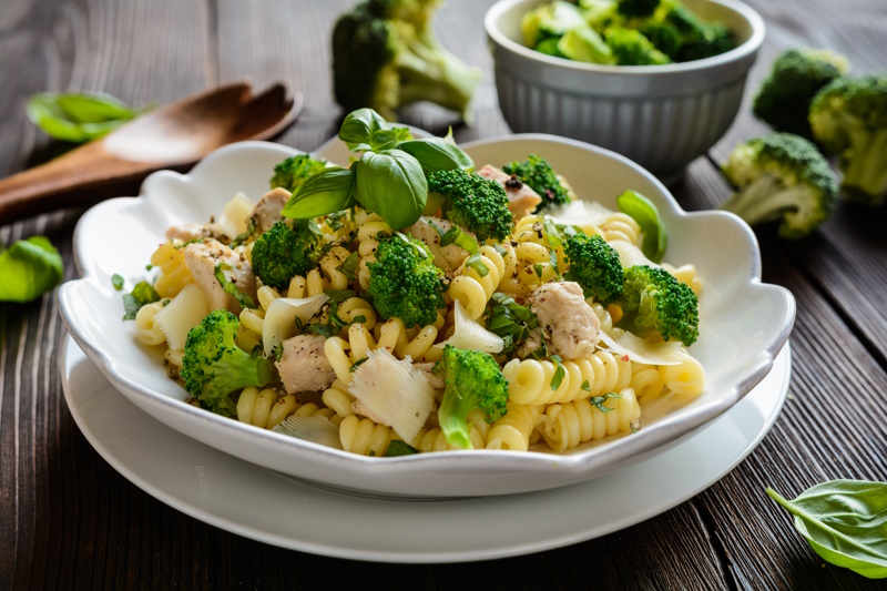 Food Photography Tutorials – The Ultimate Guide - Pasta salad with chicken meat, broccoli, cheese and basil
