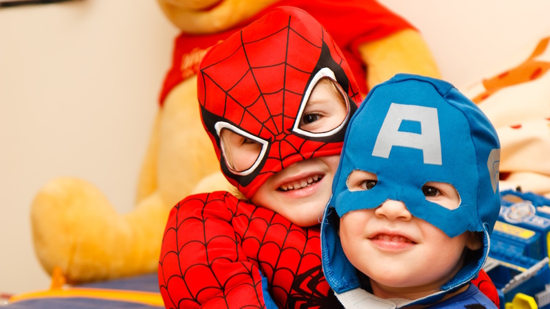 kids wearing a costume of Superhero