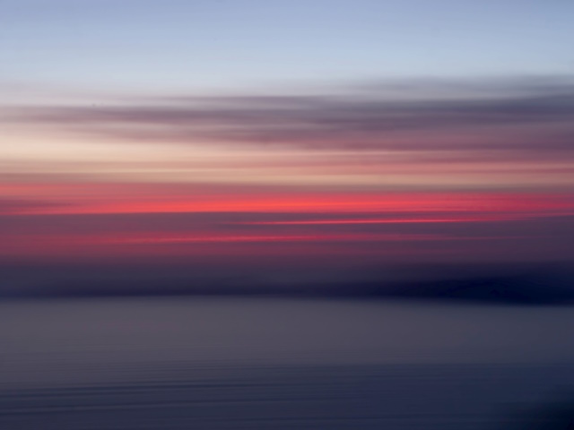 Palmaria sunset, scenic Liguria with intentional camera movement for beautiful blurry effect.